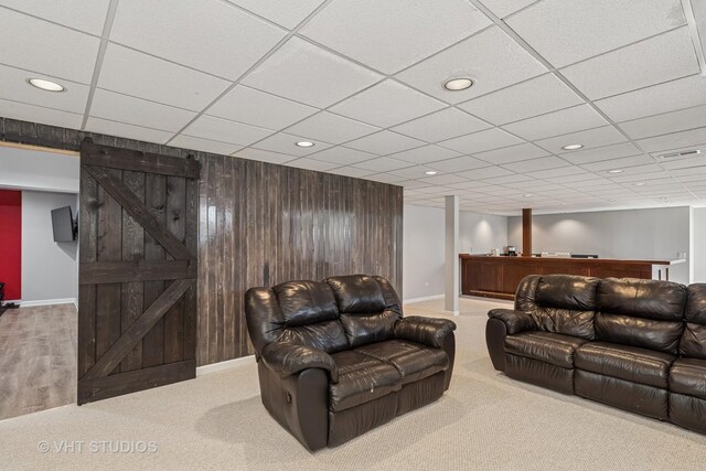3937 Lakeview Ct, Long Grove, IL 60047 - carpeted living room with recessed lighting, baseboards, a drop ceiling, and a barn door
