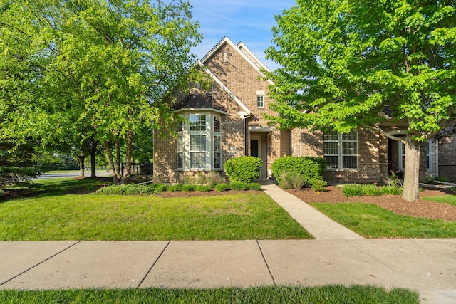 2904 Portage St, Naperville, IL 60564 - view of front of home with brick siding and a front lawn