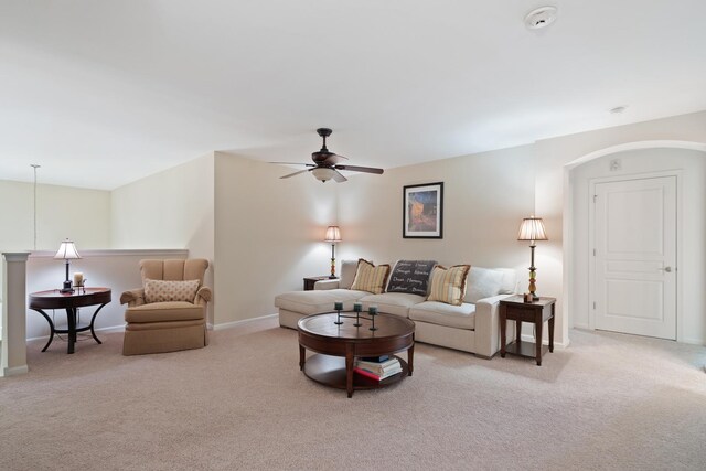2904 Portage St, Naperville, IL 60564 - living room with carpet flooring, ceiling fan, baseboards, and arched walkways
