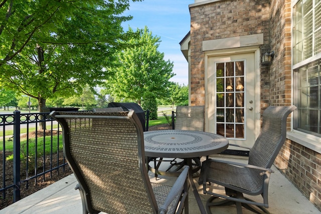 2904 Portage St, Naperville, IL 60564 - view of patio with outdoor dining space and a balcony
