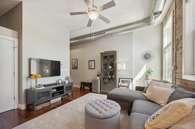 3133 N Lakewood Ave Unit 3I, Chicago, IL 60657 - living area with dark wood-style flooring, ceiling fan, a towering ceiling, and baseboards