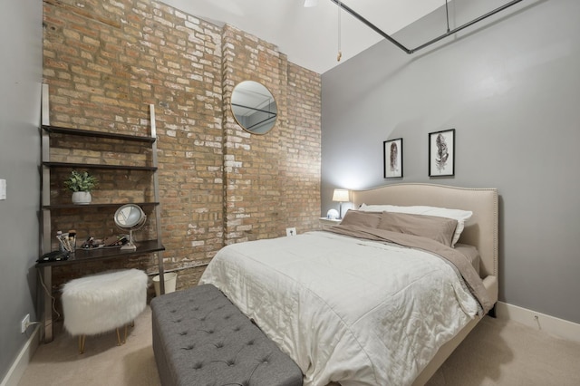 3133 N Lakewood Ave Unit 3I, Chicago, IL 60657 - carpeted bedroom featuring brick wall and baseboards