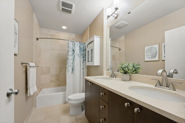 3133 N Lakewood Ave Unit 3I, Chicago, IL 60657 - bathroom featuring toilet, shower / tub combo, tile patterned flooring, double vanity, and baseboards