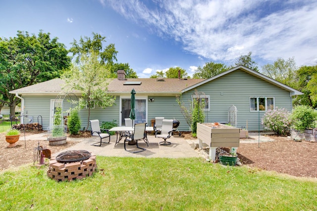 2006 Bristol Ct, Naperville, IL 60565 - rear view of house featuring an outdoor fire pit, a patio, a lawn, and a chimney