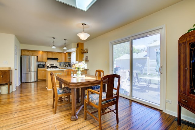 2006 Bristol Ct, Naperville, IL 60565 - dining area featuring light wood finished floors, plenty of natural light, and baseboards