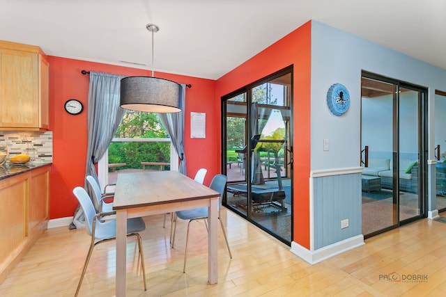 5538 Prairiemoor Ln, Long Grove, IL 60047 - dining space featuring light wood-style floors and baseboards