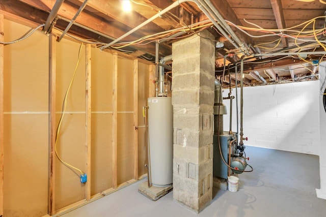 unfinished basement with gas water heater and a heating unit