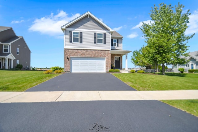 7605 Violet Ln, Joliet, IL 60431 - traditional-style home featuring brick siding, asphalt driveway, a garage, and a front yard
