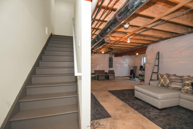 7605 Violet Ln, Joliet, IL 60431 - stairs with concrete floors and electric panel