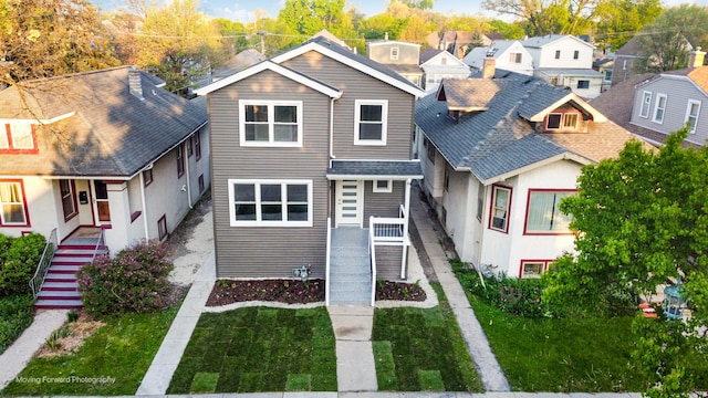 1179 S Taylor Ave, Oak Park, IL 60304 - view of front of house with stairway and a residential view