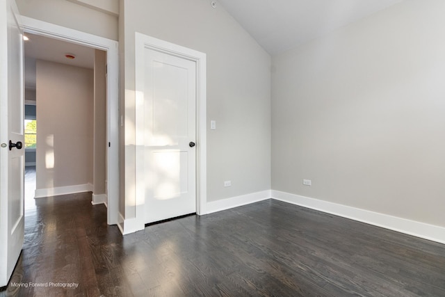 1179 S Taylor Ave, Oak Park, IL 60304 - spare room featuring lofted ceiling, dark wood finished floors, and baseboards