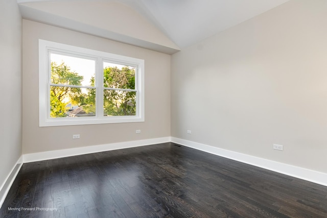 1179 S Taylor Ave, Oak Park, IL 60304 - spare room featuring dark wood-type flooring, baseboards, and lofted ceiling
