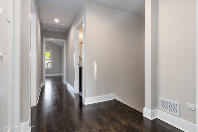 1179 S Taylor Ave, Oak Park, IL 60304 - corridor featuring dark wood-type flooring, baseboards, and attic access