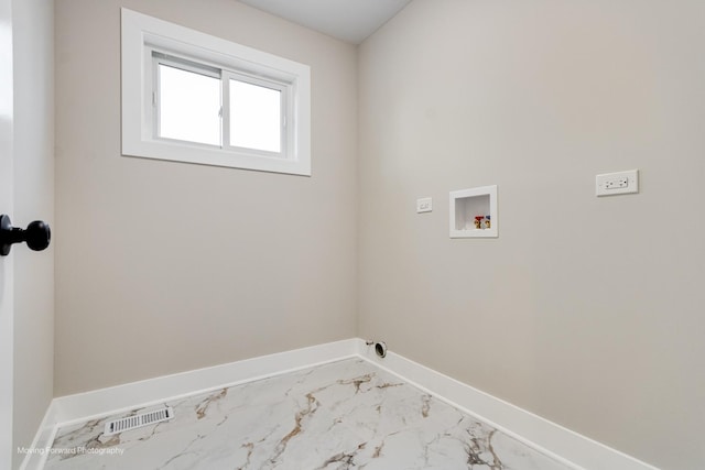 1179 S Taylor Ave, Oak Park, IL 60304 - clothes washing area with baseboards, marble look tiles, and hookup for a washing machine