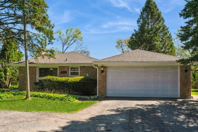 1727 Dundee Rd, Northbrook, IL 60062 - ranch-style home featuring brick siding, a garage, and a shingled roof
