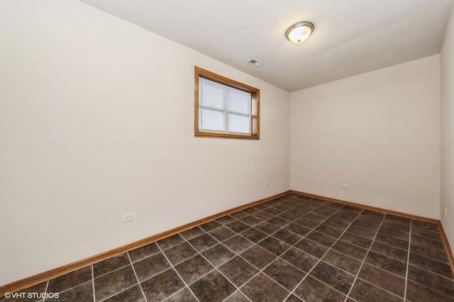 unfurnished room featuring baseboards