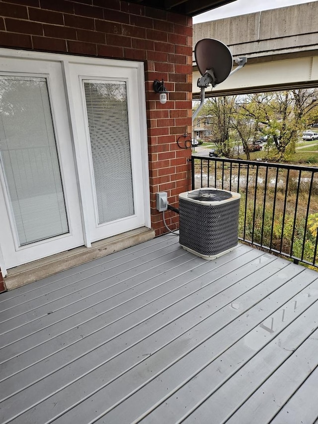 wooden terrace featuring central AC