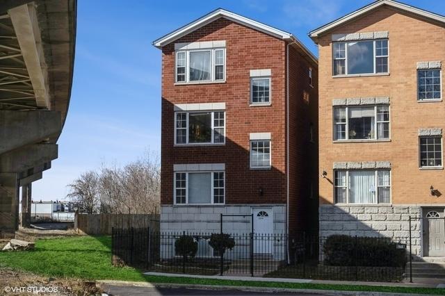 view of front of property featuring brick siding