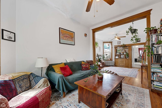 3310 S Lowe St, Chicago, IL 60616 - living room featuring radiator, a ceiling fan, and wood finished floors