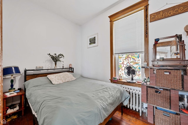 3310 S Lowe St, Chicago, IL 60616 - bedroom featuring radiator heating unit and wood-type flooring