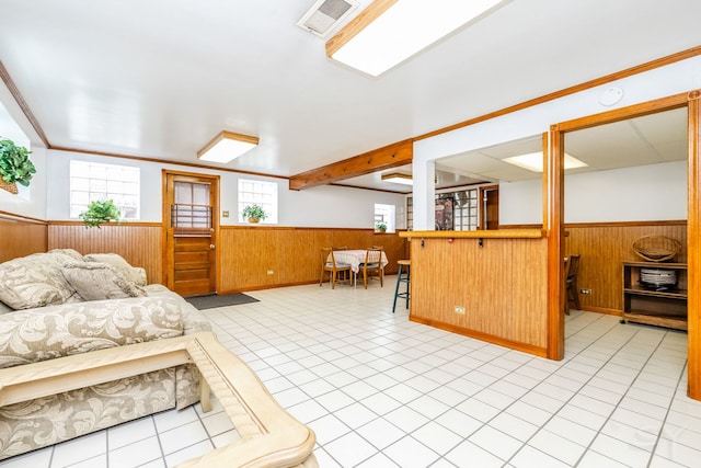 3730 Wenonah Ave, Berwyn, IL 60402 - bedroom with wainscoting, wooden walls, and light tile patterned flooring