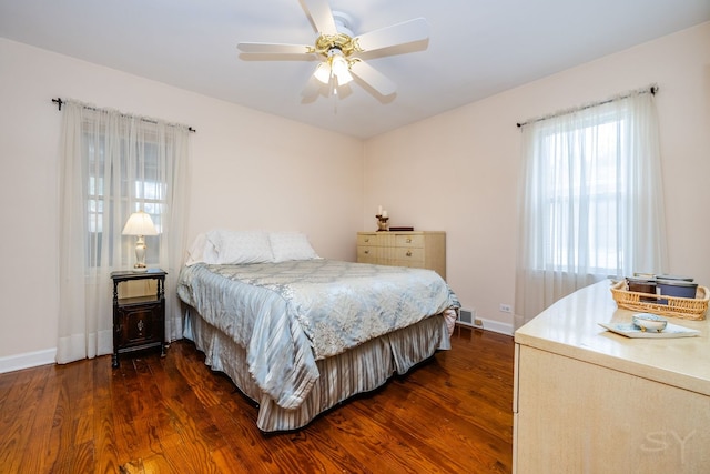 3730 Wenonah Ave, Berwyn, IL 60402 - bedroom featuring dark wood-style floors, baseboards, and ceiling fan
