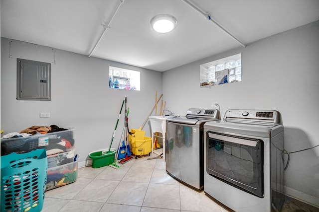 1636 S 14th Ave, Maywood, IL 60153 - washroom with washing machine and clothes dryer, electric panel, light tile patterned floors, and a sink