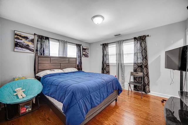 1636 S 14th Ave, Maywood, IL 60153 - bedroom with light wood-type flooring and baseboards