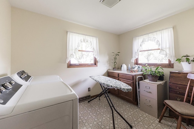 21066 Virginia Rd, Dekalb, IL 60115 - washroom with washer and clothes dryer and healthy amount of natural light
