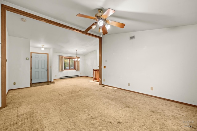 carpeted empty room with a baseboard radiator, ceiling fan, baseboards, a smoke detector, and a chandelier