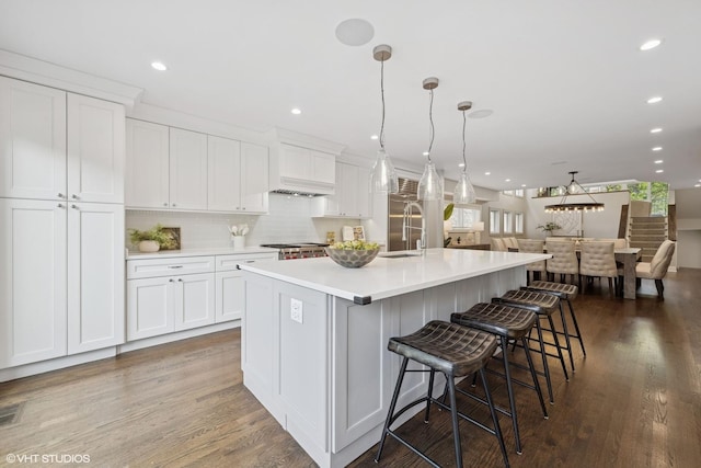 1048 W Webster Ave, Chicago, IL 60614 - kitchen with plenty of natural light, white cabinets, light countertops, and recessed lighting