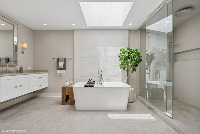 1048 W Webster Ave, Chicago, IL 60614 - bathroom featuring recessed lighting, vanity, a stall shower, a soaking tub, and a skylight