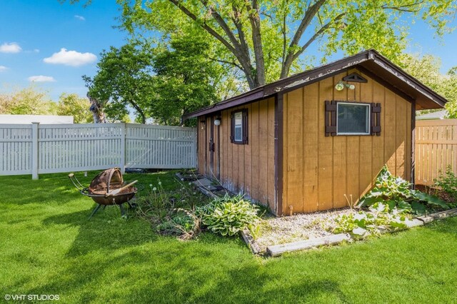 1179 Pegwood Dr, Elgin, IL 60120 - view of outbuilding featuring an outdoor fire pit