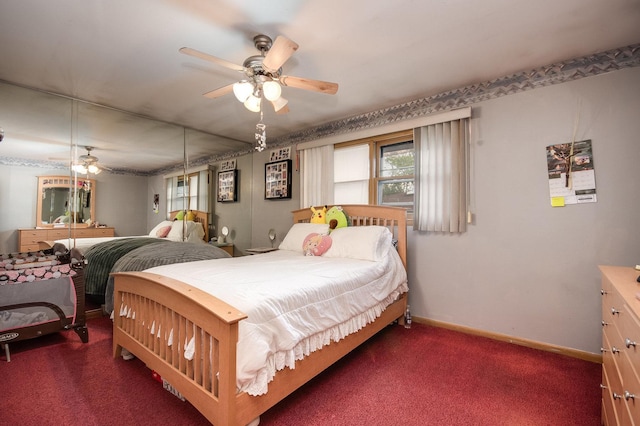 carpeted bedroom with baseboards and a ceiling fan