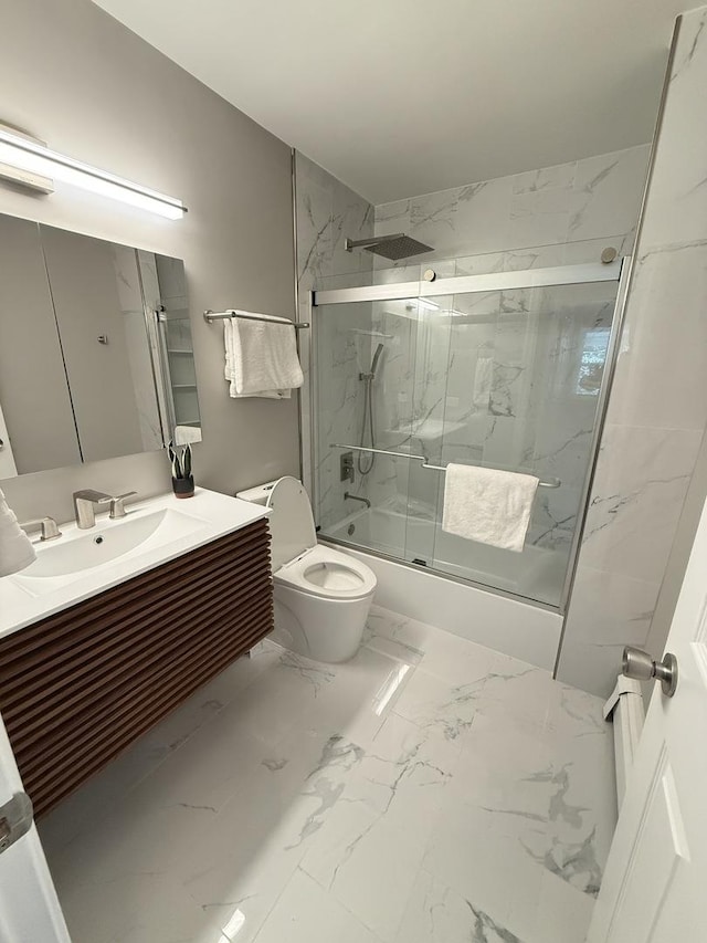 11 S Roberts Rd, Inverness, IL 60067 - full bathroom featuring toilet, marble finish floors, vanity, and bath / shower combo with glass door