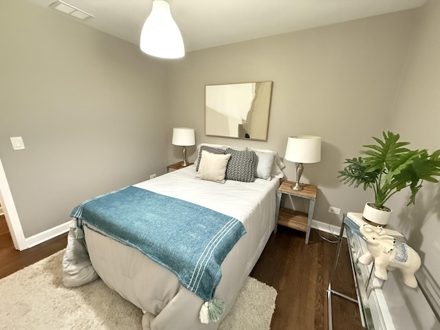 11 S Roberts Rd, Inverness, IL 60067 - bedroom with baseboards and wood finished floors