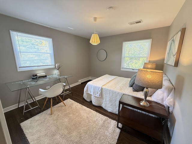 11 S Roberts Rd, Inverness, IL 60067 - bedroom featuring dark wood-style floors, a desk, baseboards, and a baseboard heating unit