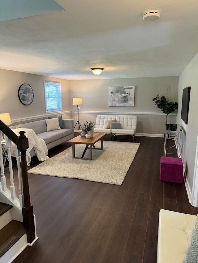 11 S Roberts Rd, Inverness, IL 60067 - living room featuring dark wood-style floors, a wainscoted wall, and stairway