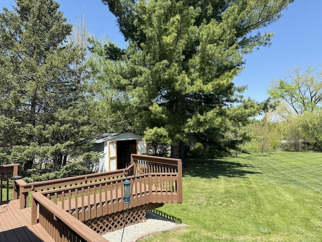 11 S Roberts Rd, Inverness, IL 60067 - view of property's community featuring a wooden deck, a lawn, an outbuilding, and a storage unit