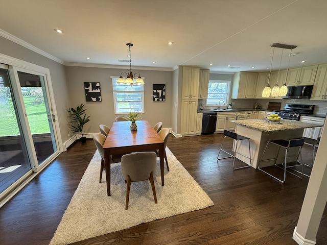 11 S Roberts Rd, Inverness, IL 60067 - dining space with baseboards, recessed lighting, dark wood finished floors, a chandelier, and ornamental molding