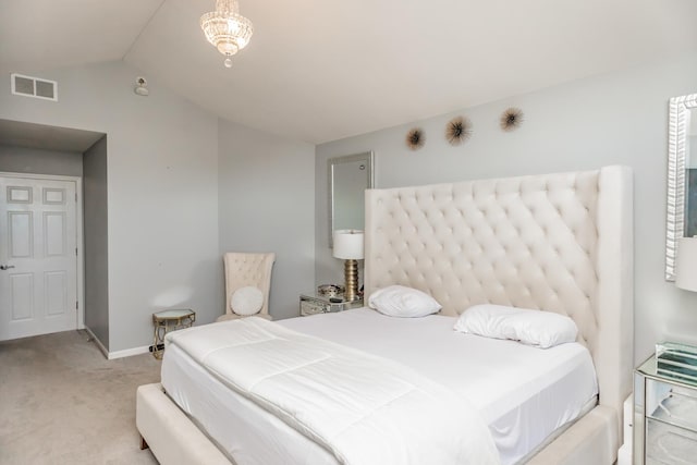 carpeted bedroom with lofted ceiling and baseboards