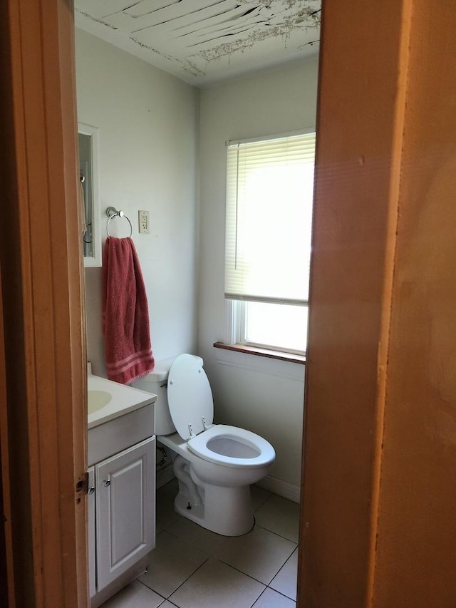 14636 Clark St, Dolton, IL 60419 - half bathroom with vanity, tile patterned floors, and toilet
