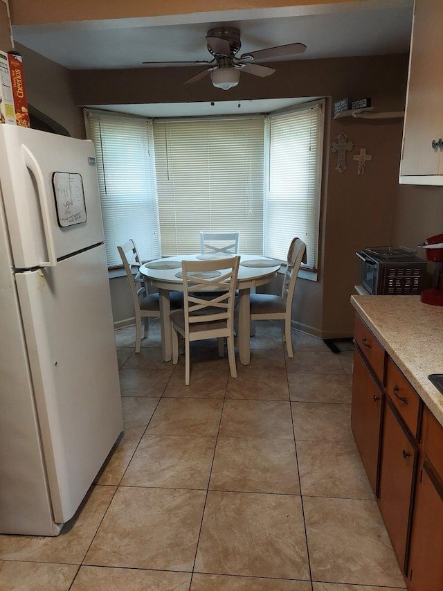14636 Clark St, Dolton, IL 60419 - dining area with ceiling fan and light tile patterned flooring