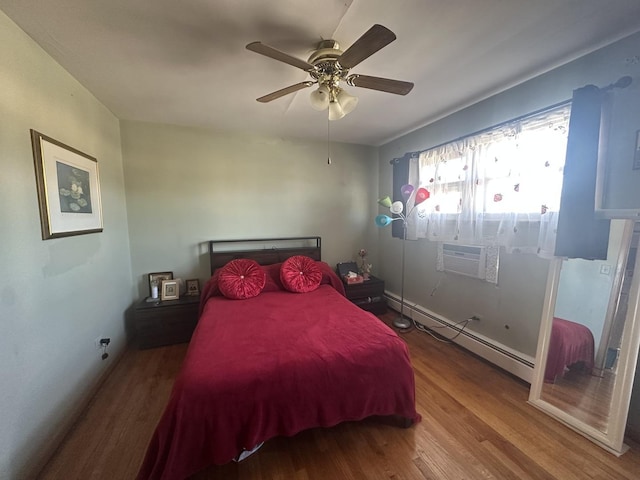 16 King Arthur Ct Unit 16, Northlake, IL 60164 - bedroom with a baseboard radiator, wood finished floors, and ceiling fan