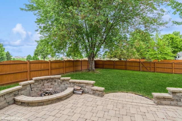 1722 John St, Yorkville, IL 60560 - view of patio featuring a fire pit