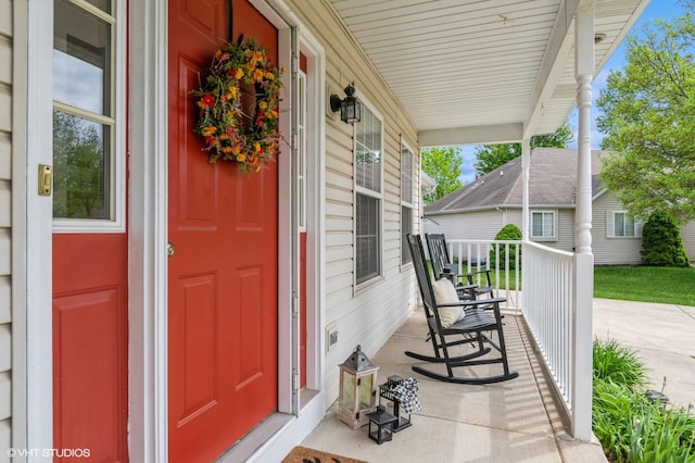 1722 John St, Yorkville, IL 60560 - property entrance featuring covered porch