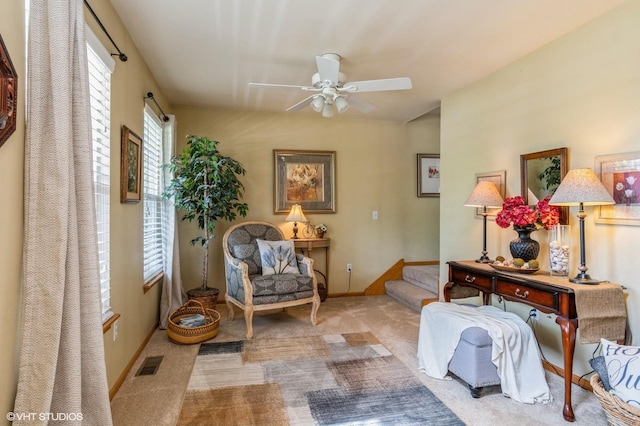 1722 John St, Yorkville, IL 60560 - living area featuring carpet, ceiling fan, stairway, and baseboards
