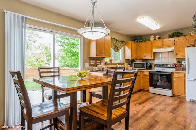 1722 John St, Yorkville, IL 60560 - dining space with light wood finished floors