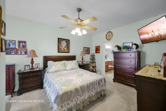 1677 Brightwood Pl Unit 8B, Aurora, IL 60506 - bedroom featuring light colored carpet, ensuite bath, and ceiling fan