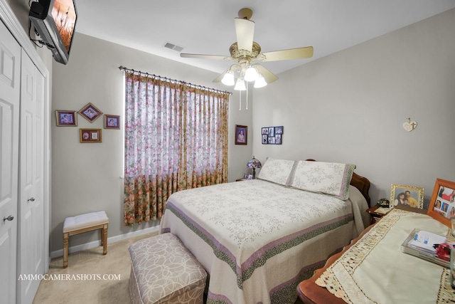 1677 Brightwood Pl Unit 8B, Aurora, IL 60506 - carpeted bedroom featuring a closet, baseboards, and a ceiling fan
